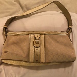 Slightly used Liz Claiborne clutch.  Tan
